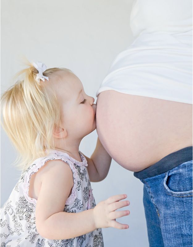 kissing Pregnant Stomach